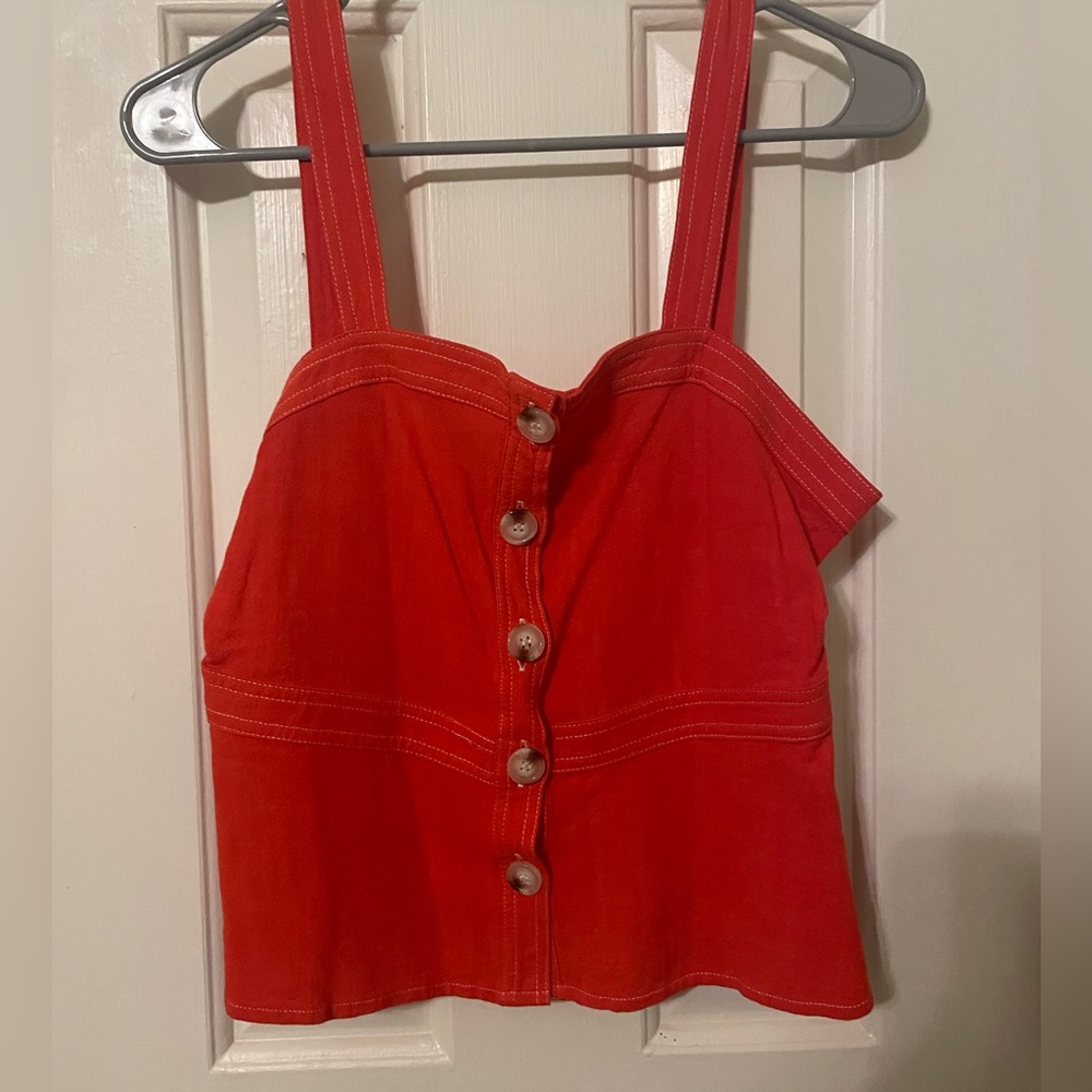 NWT. Orange/red tank with buttons from Francesca’s. Size small.
